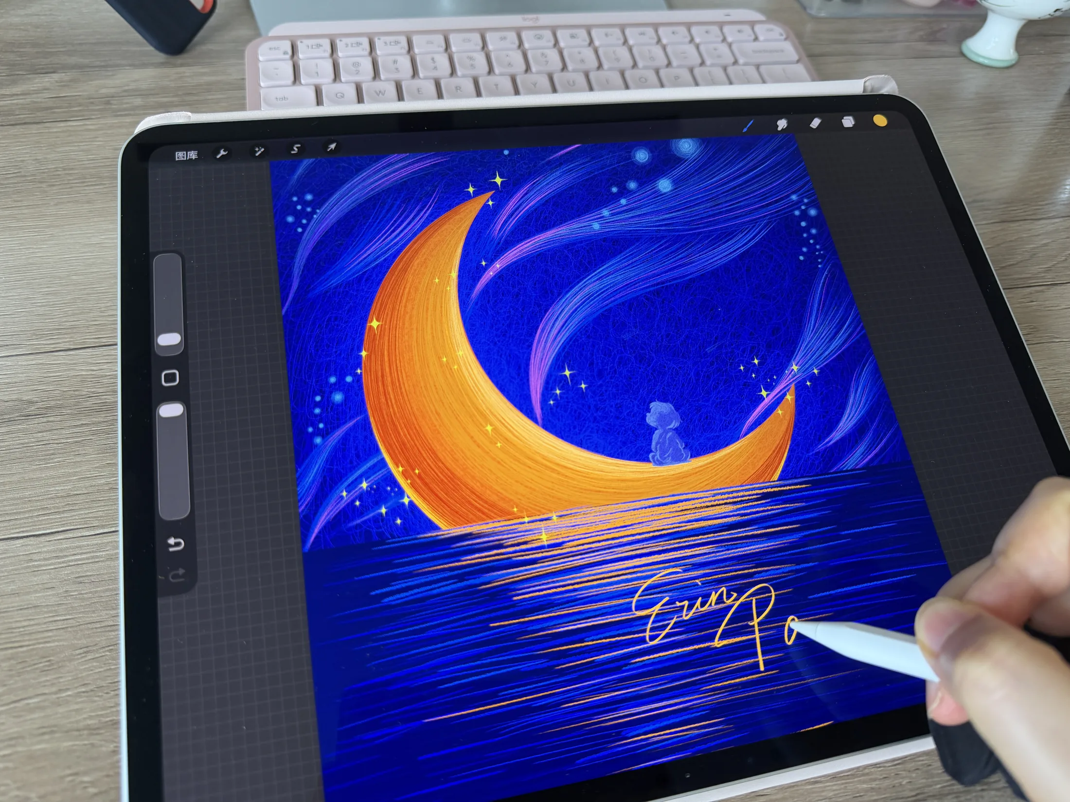 Erin drawing on an iPad